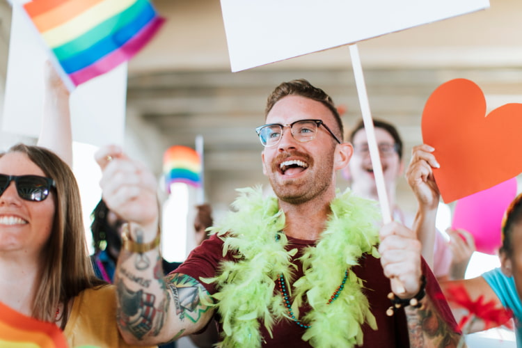 supporters cheer during a san francisco pride rally