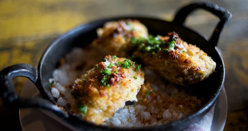 Baked oysters in a dish at Marlowe San Francisco