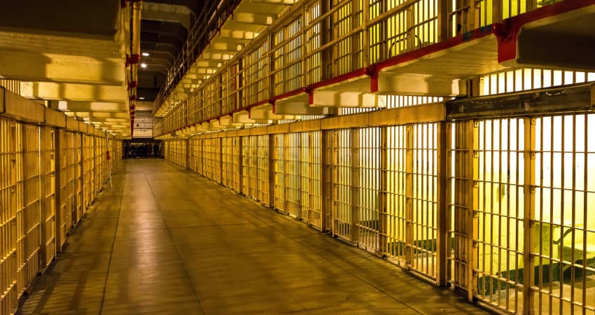 Interior of the Alcatraz cellhouse, rows upon rows of jaill cells stretching down a hallway