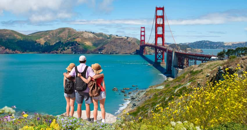 A group of people viewing the Golden Gate Bridge