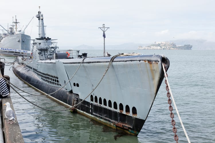 the USS pampanito ship at fisherman's wharf, parked in the water