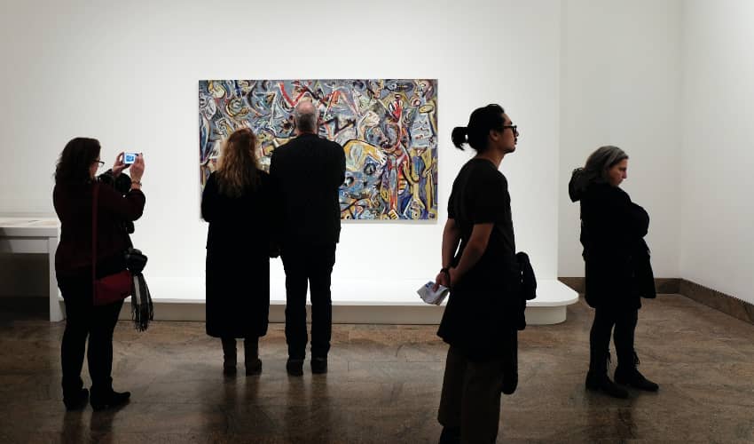 People viewing work in a museum gallery