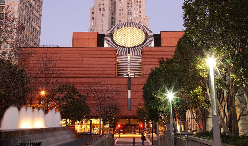 The exterior of the San Francisco MoMA in the evening 